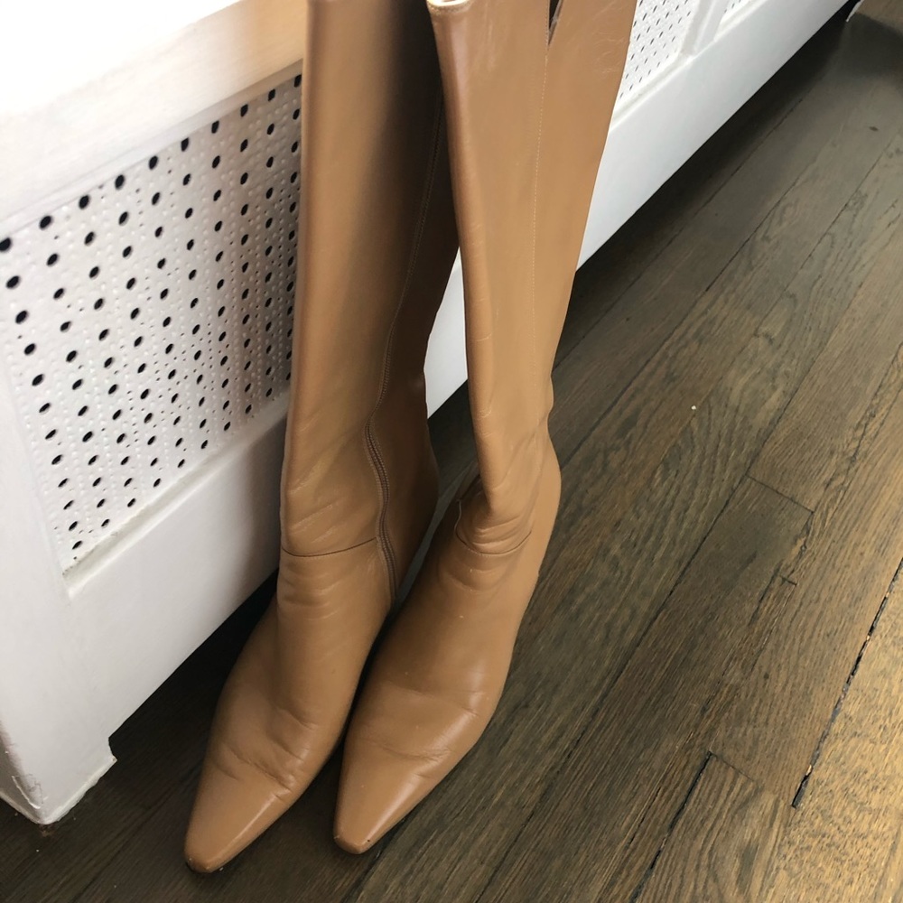 Stuart Weitzman leather boots in tan.